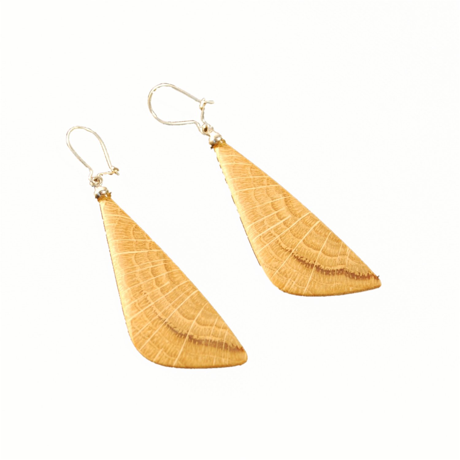 Fashionable earrings made of oak wood